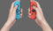 Nintendo Switch OLED - Blauw/Rood