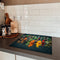 KitchenYeah® Inductie beschermer - Afdekplaat kookplaat - 60x52 cm - Kleurrijk met kruiden en lepels