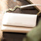 Selencia Hoesje Geschikt voor Samsung Galaxy S21 Plus Hoesje Met Pasjeshouder - Selencia Tierra Uitneembare Slang Clutch - Wit