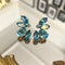 Oorbellen met kristallen: the blue Crystal leaves