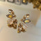 Oorbellen met kristallen: the Crystal leaves with blue