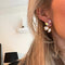 Oorbellen met kristallen: the Crystal leaves with pink
