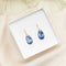Oorhangers met blauwe kristal-druppels