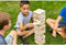 Outdoor Play Stapeltoren - Speelgoed - 60 blokken - Geschikt voor binnen en buiten - Inclusief draagzak