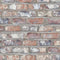 Dutch Wallcoverings vliesbehang baksteen - beige/blauw