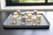 Petits Candles - Kaarsen in kaarsenhouder - 12 Stuks - Groen - Ø 3 cm - Hoogte 5 cm