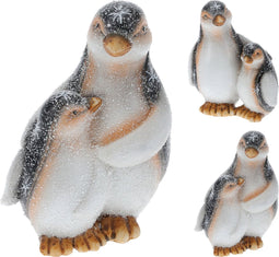 Pinguins ouder en kind staand kerstversiering