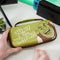 Numskull NS4289 - Opbergtas voor Nintendo Switch - Bescherming en fandom - Bruin Groen