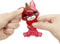 Rainbow High Klassieke Modepop - 28 cm - Ruby (rood) - Met slijmset en diertje