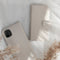 Selencia Hoesje Geschikt voor iPhone 12 Mini Hoesje Met Pasjeshouder - Selencia Echt Lederen Bookcase - Lichtgrijs