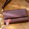 Selencia Hoesje Geschikt voor iPhone 12 Pro / 12 Hoesje Met Pasjeshouder - Selencia Tierra Uitneembare Slang Clutch - Donkerrood