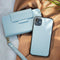 Selencia Hoesje Geschikt voor iPhone SE (2022) / SE (2020) / 8 / 7 / 6s / 6 Hoesje Met Pasjeshouder - Selencia Surya 2-in-1 Uitneembare Vegan Lederen Bookcase - blauw