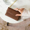 Selencia Hoesje Geschikt voor Samsung Galaxy A51 Hoesje Met Pasjeshouder - Selencia Eny Uitneembare Vegan Lederen Clutch - Bruin