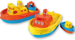 Sleepboot met klein bootje