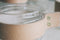 TAK Design Vaas Wrap Me - Incl. Lederen Band - Glas - Ø10 x 30 cm - Bruin