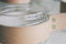 TAK Design Vaas Wrap Me - Incl. Lederen Band - Glas - Ø19 x 20 cm - Bruin