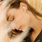 Happy Plugs Hope - Draadloze In-ear Oordopjes - 30 uur batterijduur - Goud/Wit