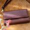 Selencia Hoesje Geschikt voor Samsung Galaxy A51 Hoesje Met Pasjeshouder - Selencia Tierra Uitneembare Slang Clutch - Donkerrood
