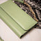 Selencia Hoesje Geschikt voor Samsung Galaxy A33 Hoesje Met Pasjeshouder - Selencia Tierra Uitneembare Slang Clutch - Groen