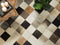 Beliani Area Rug Multicolour Cowhide Leather 80 x 150 cm Rectangular Patchwork Handcrafted