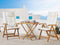 Beliani Garden Bistro Set Acacia Wood Table 2 Chairs with Off-White Cushions UV Resistant Foldable