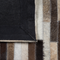 Beliani SINNELI - Short pile rug - Brown - 140x200 cm - Cowhide leather