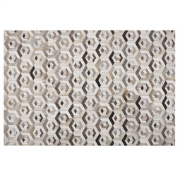 Beliani TAVAK - Patchwork rug - Brown - 160 x 230 cm - Cowhide leather