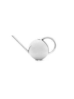 Stylish metal watering can for indoor use.