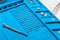 Silicone soldering mat as a flexible work surface for safe soldering, repairs and handicrafts, non-s