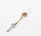 Tusk-Shaped Resin & Tasseled Gold-Toned Keychain