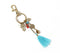 Gold-Toned Iron Charms & Tassel Keychain