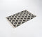 Handwoven Lattice Monochrome Tasseled Rug