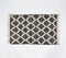 Handwoven Lattice Monochrome Tasseled Rug