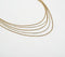 Layered Metallic Necklace with Beaded Accents