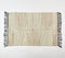 Tufted & Tasseled Neutral rug