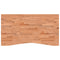 Bureaublad 110x(55-60)x4 cm massief beukenhout