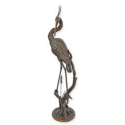 BRONZEN REIGER OP BOOMSTRONK FONTEIN