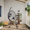 Hangstoel met standaard rattan en staal lichtgrijs