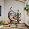 Hangstoel met standaard rattan en staal taupe