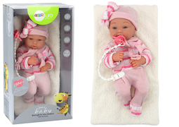 Babypop - roze kleding - beweegbare ledematen - incl. accessoires