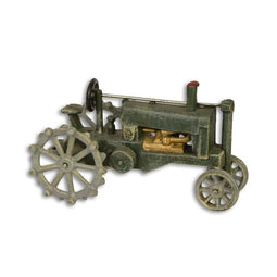 Gietijzeren model van een groene tractor