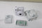 Fujifilm instax Mini 12 Bundel - Instant camera + 1 x 10 stuks film, cameratas & stickers - Clay White & Marble