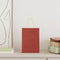 Papieren kraftzakken 50 st met hengsels 15x8x21 cm rood