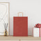Papieren kraftzakken 50 st met hengsels 26x12x35 cm rood