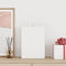 Papieren kraftzakken 250 st met hengsels 26x12x35 cm wit