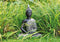 Buddha zittend in zilver van poly, 29 cm.
