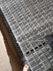 vidaXL Tuintafel met acaciahouten blad 105x80x110 cm poly rattan grijs