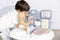 Smoby Baby Care Zorgcentrum - Dokter - Inclusief accessoires - Groen Roze Blauw Grijs