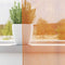 vidaXL - Gordijnen - voile - met - doorvoertules - 2 - st - 140x140 - cm - oranje