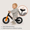 Lionelo Toni - Loopfiets - Voor kinderen vanaf 18 mnd - Verstelbaar zadel en stuur - Lichtgewicht 2,3 kg - Kleur zwart/oranje
